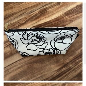 Logan and Lenora (now Canvelle) spoiled home make up pouch
